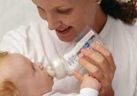 baby safety: mother feeding baby
